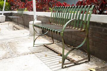 Poster - Old metal bench in urban park,  municipal outdoor decoration.