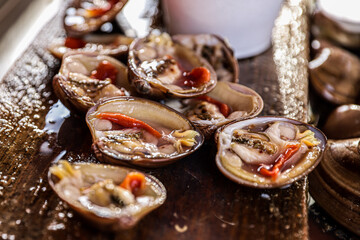 Piled clams, fresh food, seafood, seafood in Kino Viejo bay,  clam in its shell, chocolate clam. Coelominated protostome invertebrate molluscs, non-segmented bilateral symmetry triblastic, are soft-bo