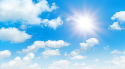 Wall Mural - sunny day background, blue sky with white cumulus clouds and glaring sun, natural summer or spring b