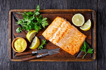 Canvas Print - grilled salmon fillet on a wooden cutting board