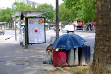Some Luggage Belonging To A Homeless Person In The Street Of Paris. Summer 2021, July, Paris, France.