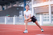 © EduLife Photos - A young beautiful Asian woman in sports outfits doing stretching before workout outdoor in the park in the morning to get a healthy lifestyle. Healthy young woman warming up outdoors