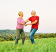 © Lumos sp - woman man outdoor senior couple happy elderly training active exercise stretching fitness  retirement together love dancing nature mature