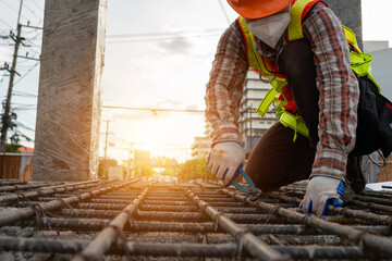 Sticker - Workers are working at the building construction site.