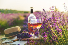 Wine In Glasses. Picnic In The Lavender Field. Selective Focus.