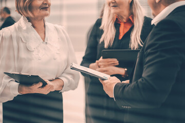 Wall Mural - boss discusses with the staff of the financial data