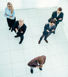 © yurolaitsalbert - top view. group of diverse business people standing in the office.
