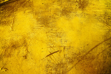 Wall Mural - Old gold background or texture and Gradients shadow with scratches