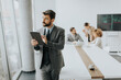 © BGStock72 - Young modern businessman using digital tablet in the office