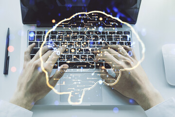 Poster - Creative artificial Intelligence concept with human brain hologram and hands typing on laptop on background. Multiexposure