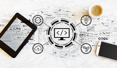 Web development concept with tablet and phone