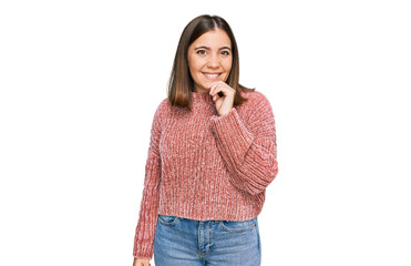 Canvas Print - Young beautiful woman wearing casual clothes looking confident at the camera with smile with crossed arms and hand raised on chin. thinking positive.