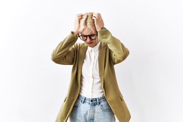 Wall Mural - Beautiful caucasian business woman standing over isolated background suffering from headache desperate and stressed because pain and migraine. hands on head.