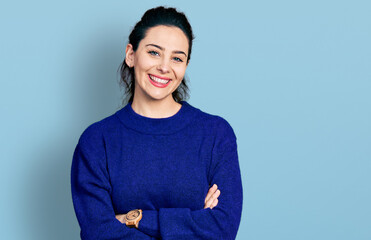 Young hispanic woman with arms crossed gesture smiling with a happy and cool smile on face. showing teeth.