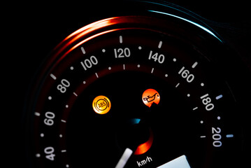 Flashing ABS symbol on dashboard of modern motorcycle. Close-up view. Motorbike, transport mode, speed concept.