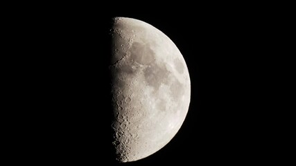 Wall Mural - First Quarter Moon moving through the sky with hot air turbulence