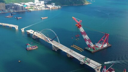 Canvas Print - Cross harbor bridge under construction