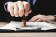 © chokniti - business finance document approve, businessman signing contract paperwork in office, people meeting for success signature investment paper, mortgage and loan, notary working with law for debt banking