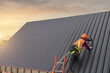 © saravut - Roofer Construction worker install new roof,Roofing tools