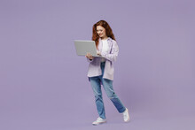 Full Size Body Length Cute Young Redhead Curly Green-eyed Woman 20 Wear White T-shirt Violet Jacket Hold Use Work On Laptop Pc Computer Isolated On Pastel Purple Color Wall Background Studio Portrait