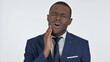 © stockbakers - African Businessman with Toothache , White Background