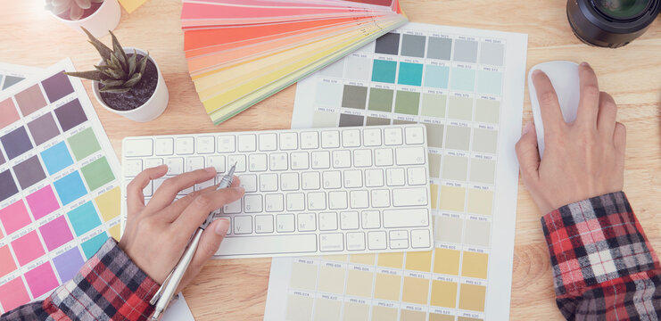 Top View of creative table working Place for graphic design.