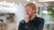 © stockbakers - Portrait of Allergic Young Redhead Man Coughing