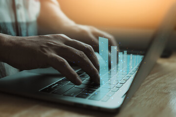 Poster - Businessman use laptop, analytics and financial and bank technology concept, chart from computer laptop, Business growth concept