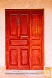 Fototapeta Paryż - Vintage wooden red door