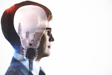 Poster - Abstract side portrait of businessman with light bulb abstraction on white background with mock up place. Idea and brainstorm concept. Double exposure.
