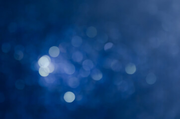 Wall Mural - abstract blue bokeh glitter sparkle background.