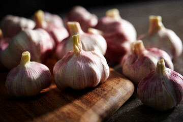 Wall Mural - fresh garlic on wooden chopping board