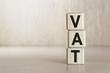 © Krystsina - Text VAT - Value-Added Tax on wooden blocks