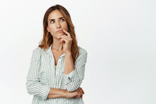 Image Of Thoughtful Woman, Wife Thinking, Looking Up And Touch Lip, Ponder Important Decision, Making Choice, Standing In Blouse Against White Background
