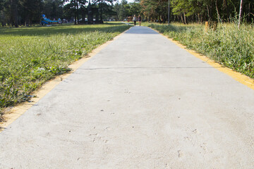 Sticker - Long sidewalk surrounded by green trees in the park Manglisi, Georgia