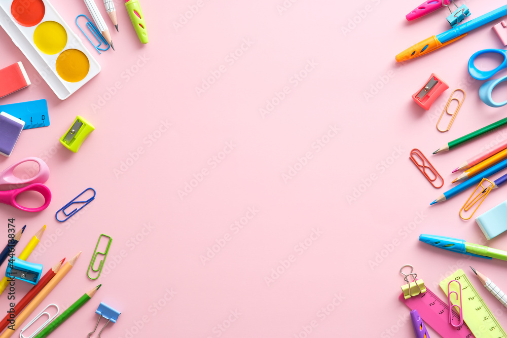Flat lay colorful school stationery on pink background. Back to school ...