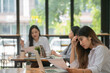 © Songsak C - Asian businesswoman gets stressed while having a problem at work in the office.