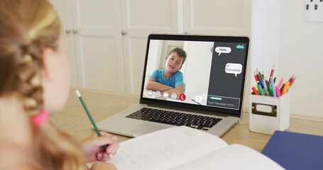 Canvas Print - Schoolgirl using laptop for online lesson at home, with her colleague and web chat on screen