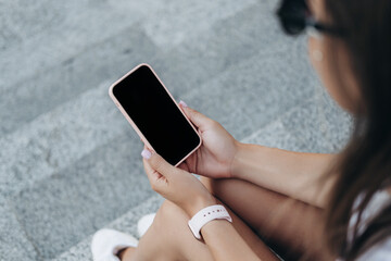 Woman Using iPhone 12 pro