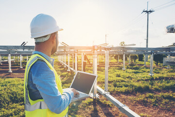 engineer inspect solar tracking machine in solar power plant; Monitor project of  automatic solar tracking