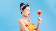 Beautiful Model Portrait Isolated Over Studio Background Holding Wine Glass