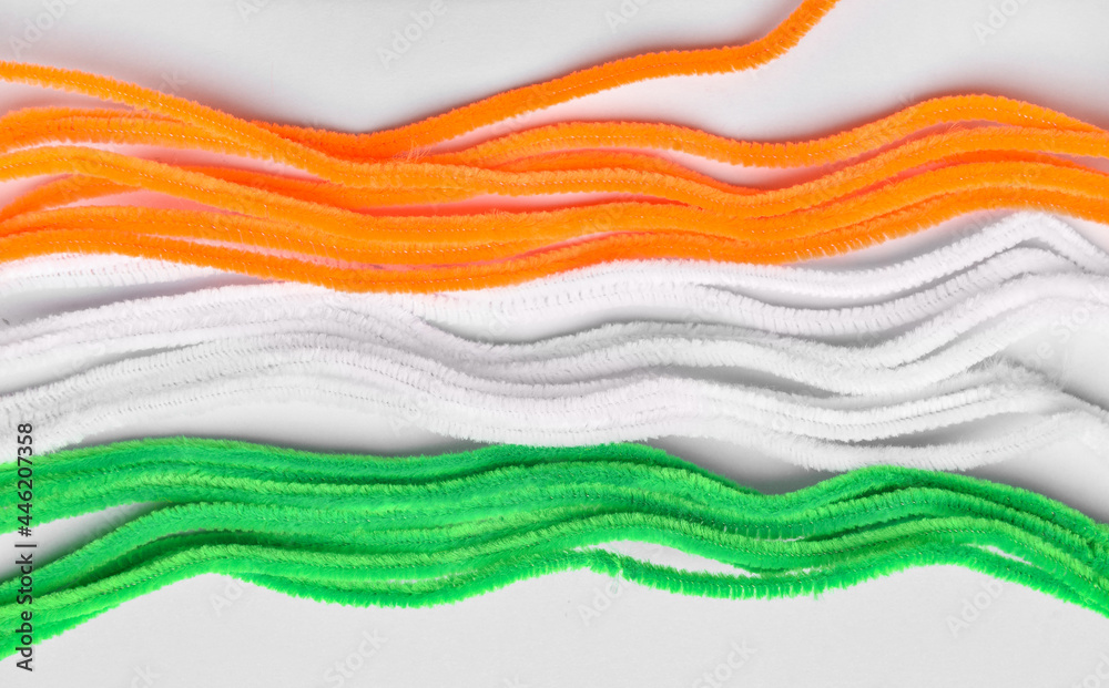 Stripes in colors of Indian flag on light background