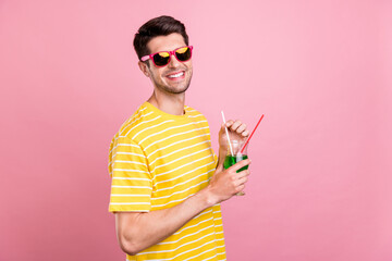 Sticker - Profile side view portrait of attractive cheerful guy drinking beverage having fun chill isolated over pink pastel color background