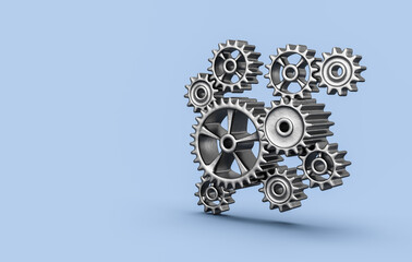 Metallic Gears on Blue Background with Copy Space