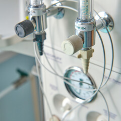 Wall Mural - A device for resuscitation of infants and checking the child on the Apgar scale after delivery. Machine for oxygen supply and resuscitation of the baby after childbirth