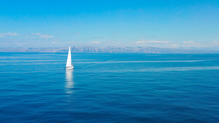 Wall Mural - Aerial view of sailing luxury yacht at opened sea at sunny day in Croatia