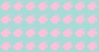 Composition of rows of pink fish on green background