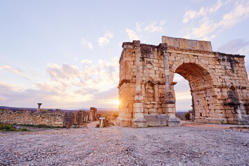 Wall Mural - Beautiful sunset lanscape. The ancient antigue roman city Volubilis in Morocco, Africa.