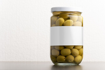 Poster - Green olives conserve with round cap on white background, editable mock-up series template