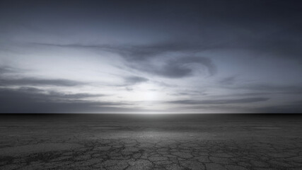 Wall Mural - dark dramatic night sky horizon background and product placement scene with cracked concrete floor